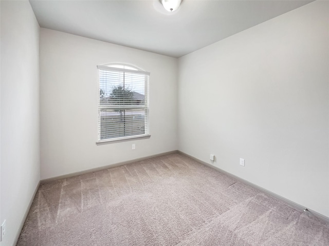 unfurnished room featuring carpet floors