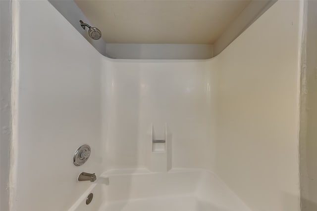 interior details with shower / bathing tub combination