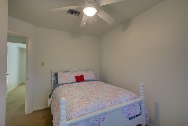 bedroom featuring ceiling fan and light colored carpet