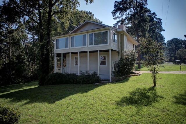 view of front of home with a front yard