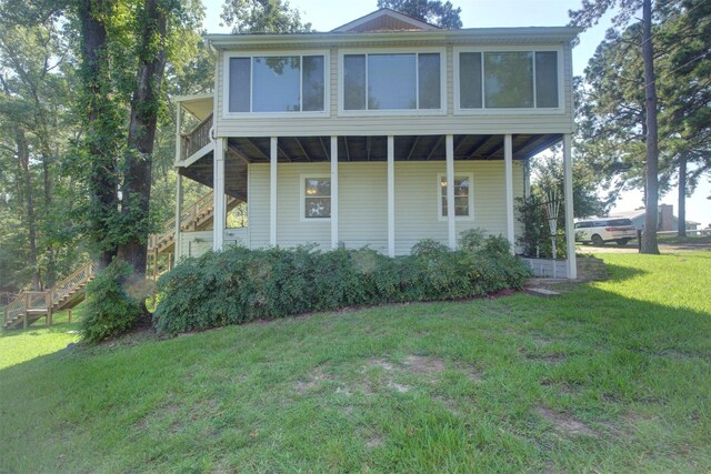 view of front of home with a front yard