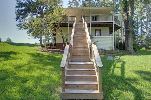 rear view of house with a yard