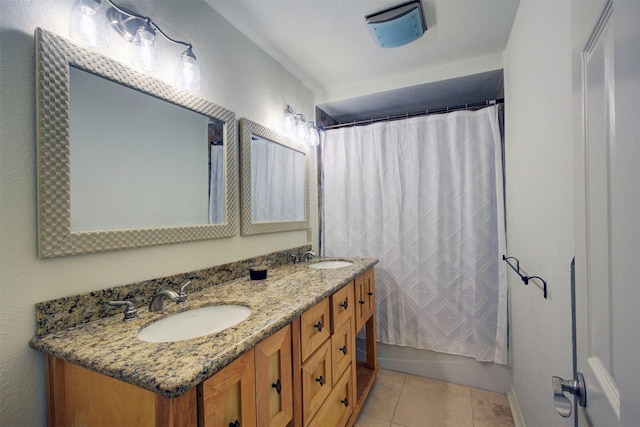 bathroom featuring vanity, tile patterned flooring, and shower / bath combination with curtain