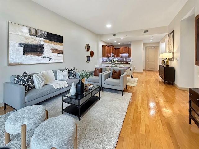 living room featuring light wood-type flooring