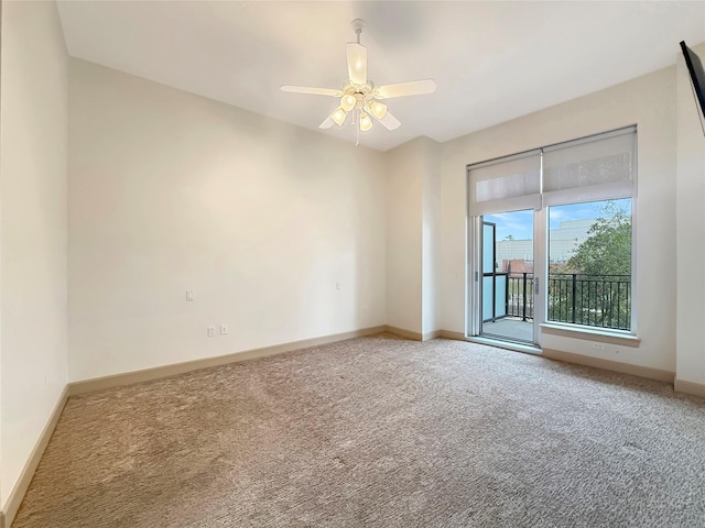 unfurnished room with carpet floors and ceiling fan