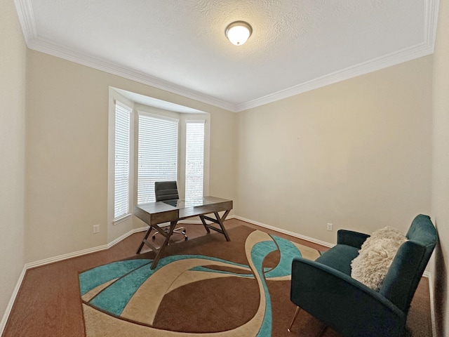 carpeted office with ornamental molding and a textured ceiling