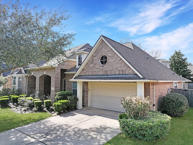 view of front of property with a garage