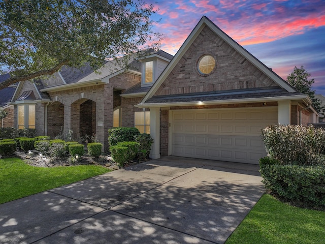 view of front of property with a yard