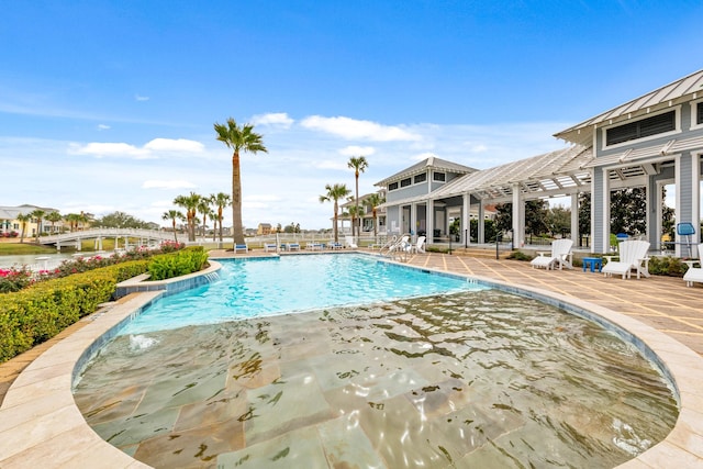 view of pool featuring a patio area