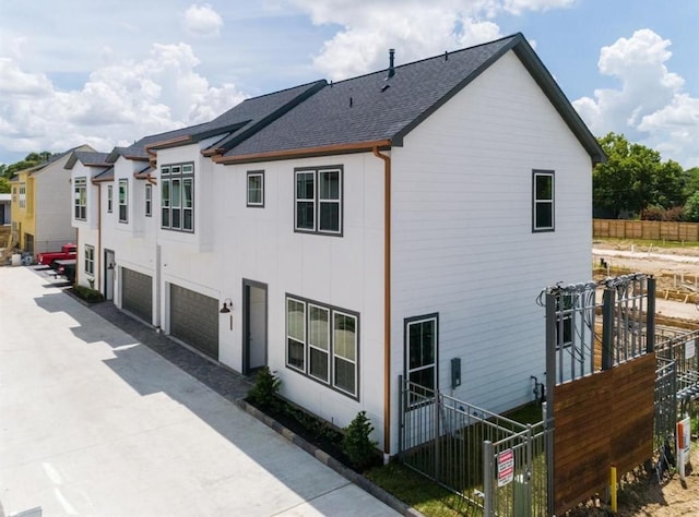 view of property exterior featuring a garage