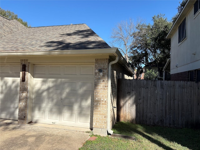 view of side of property with a garage