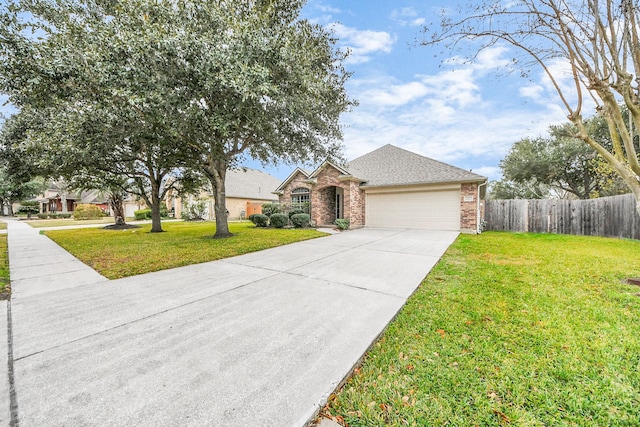 single story home featuring a garage and a front lawn