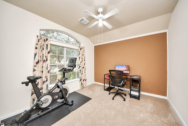 office featuring visible vents, vaulted ceiling, light carpet, and baseboards