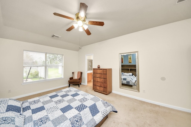 bedroom featuring light carpet, vaulted ceiling, visible vents, and baseboards