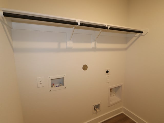 laundry area featuring washer hookup, laundry area, dark wood finished floors, baseboards, and hookup for an electric dryer