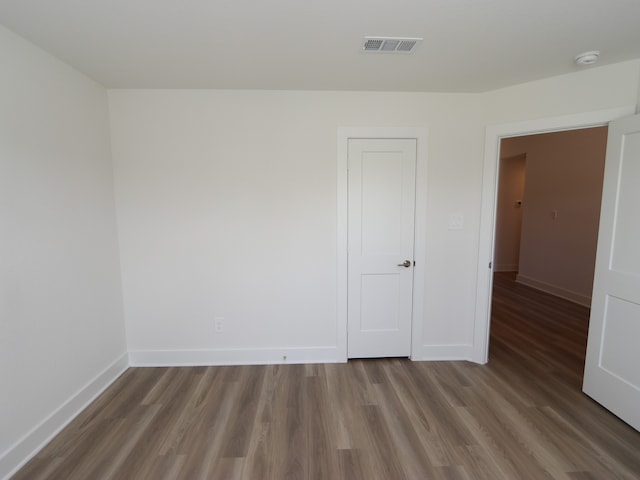 17343 Silver Birch Ct, New Caney, TX 77357 - spare room featuring wood finished floors, baseboards, and a smoke detector