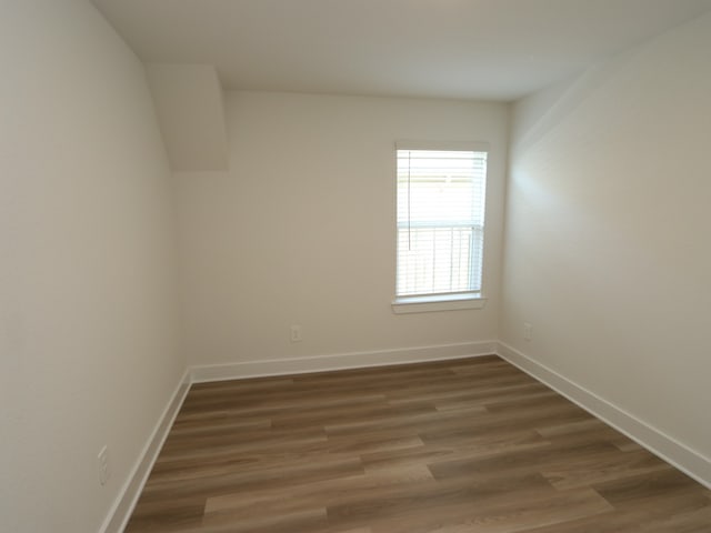 17343 Silver Birch Ct, New Caney, TX 77357 - unfurnished room with wood finished floors and baseboards