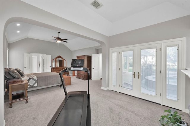 workout area with ceiling fan, french doors, vaulted ceiling, and carpet flooring