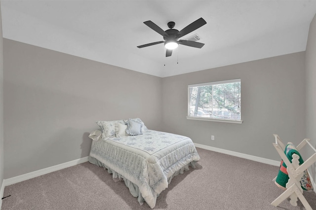 bedroom with light carpet and ceiling fan