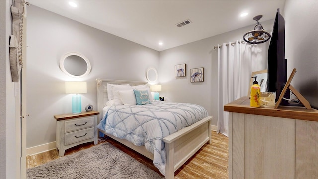 bedroom featuring light wood-type flooring