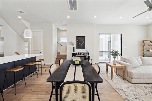 3037 Hicks St, Houston, TX 77007 - dining room with ceiling fan and light hardwood / wood-style floors