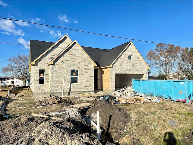 property in mid-construction with a garage