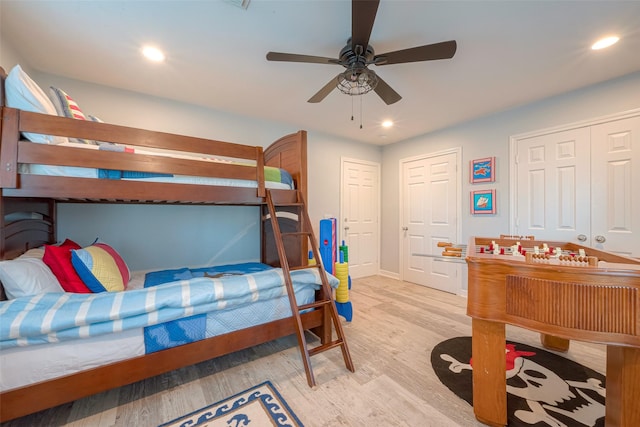 bedroom featuring ceiling fan and light wood-type flooring