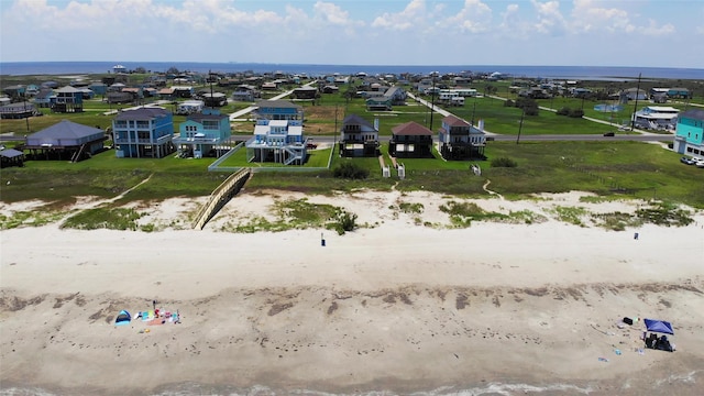 drone / aerial view with a residential view and a water view