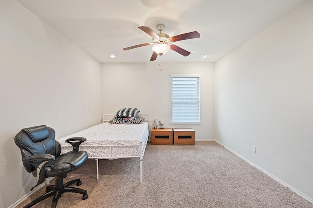 carpeted bedroom with ceiling fan