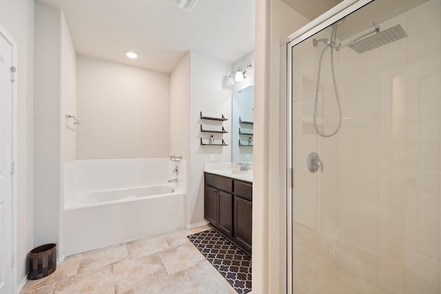 bathroom featuring separate shower and tub and vanity