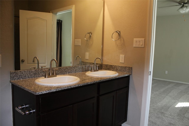 bathroom with vanity and ceiling fan