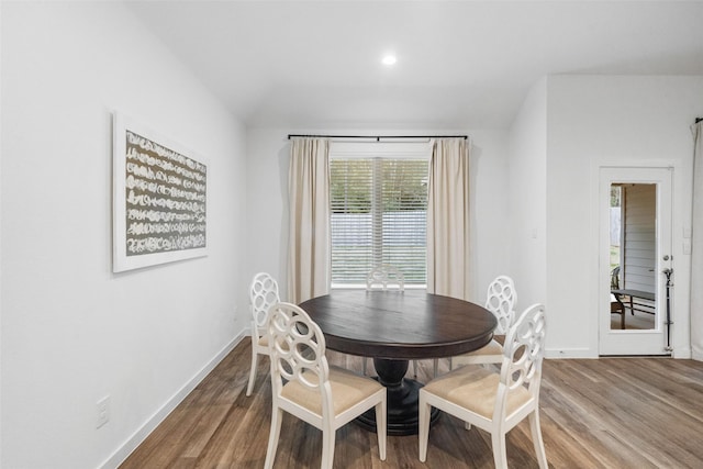 dining room with hardwood / wood-style flooring