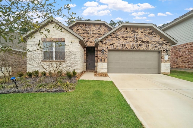 view of front of home with a garage and a front yard