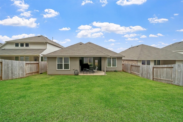 back of property featuring a lawn and a patio