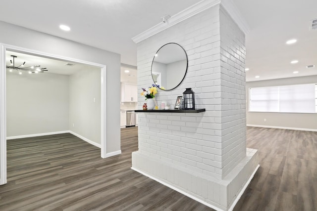 bar featuring dark hardwood / wood-style floors, tasteful backsplash, white cabinets, stainless steel dishwasher, and crown molding