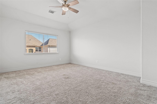 unfurnished room with ceiling fan, carpet floors, and lofted ceiling