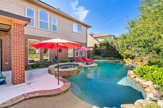 view of swimming pool featuring an in ground hot tub, a patio, and a wall mounted AC