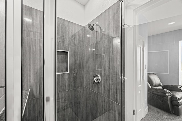 bathroom featuring tiled shower