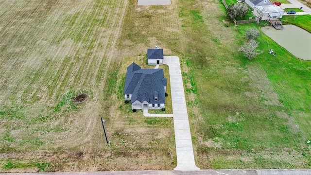 birds eye view of property featuring a rural view