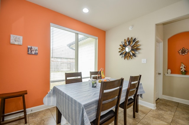 dining room featuring light tile patterned flooring