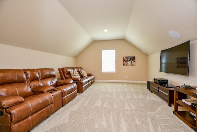 living room featuring baseboards, lofted ceiling, and light colored carpet