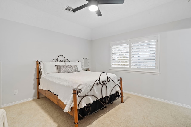 bedroom featuring ceiling fan and light colored carpet