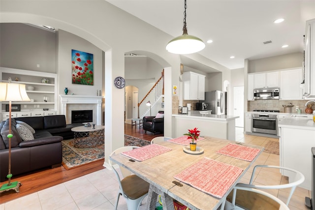 tiled dining area with sink