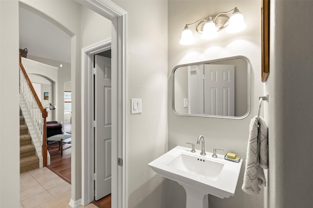 bathroom with tile patterned floors and sink