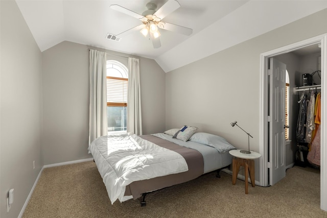 bedroom featuring ceiling fan, light colored carpet, and lofted ceiling