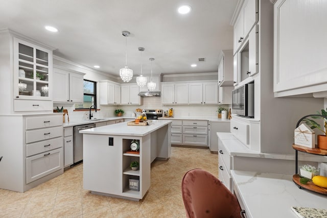 kitchen featuring open shelves, tasteful backsplash, stainless steel appliances, and a sink