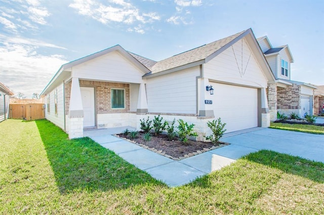 single story home featuring a front lawn and a garage