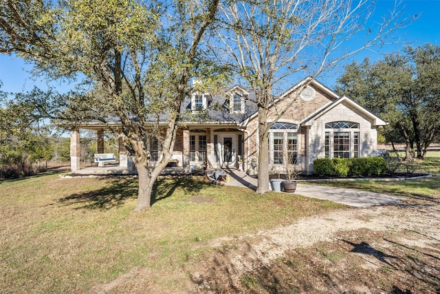 view of front of home with a front lawn