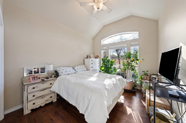 bedroom featuring ceiling fan, vaulted ceiling, and dark hardwood / wood-style flooring