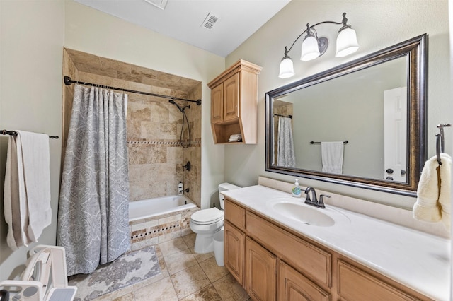 full bathroom with toilet, vanity, and shower / bath combo with shower curtain